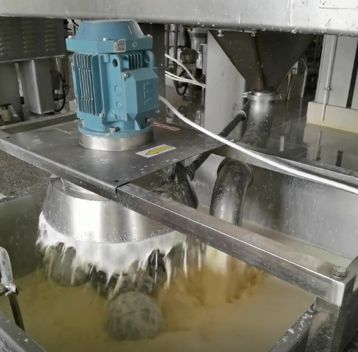 Soymilk foam breaker installed at a stainless soymilk processing tank